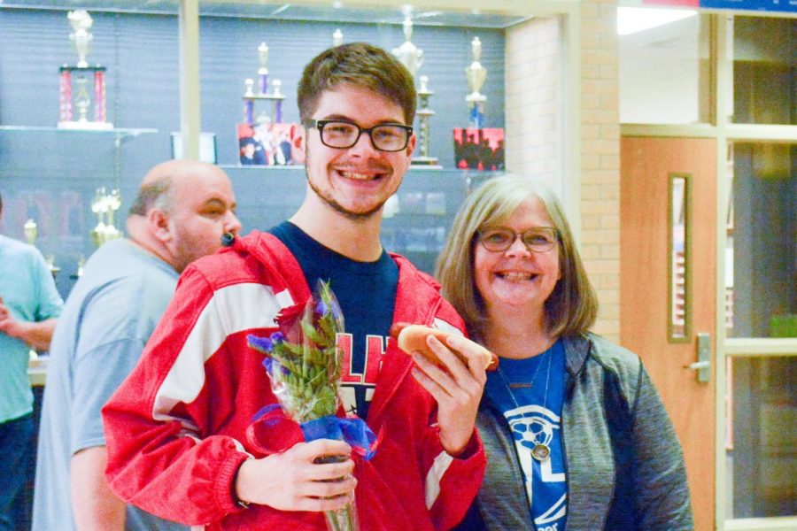 Peters with his mother, Casey, at the senior night for wrestling.