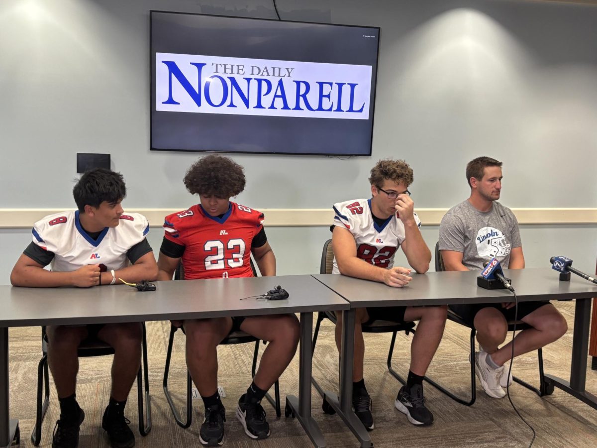 Football players speak to media on Tuesday, Aug. 5.