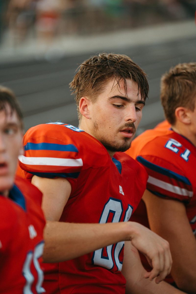 Rogers cools off on the sidelines during the game against Denison.
