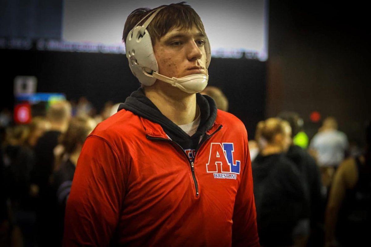 Wrestler enjoying senior year, sets the standard for underclassmen