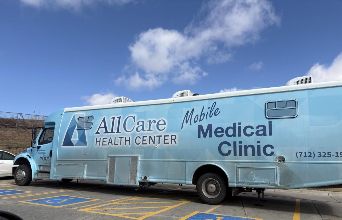 All Care Health bus in AL student parking lot